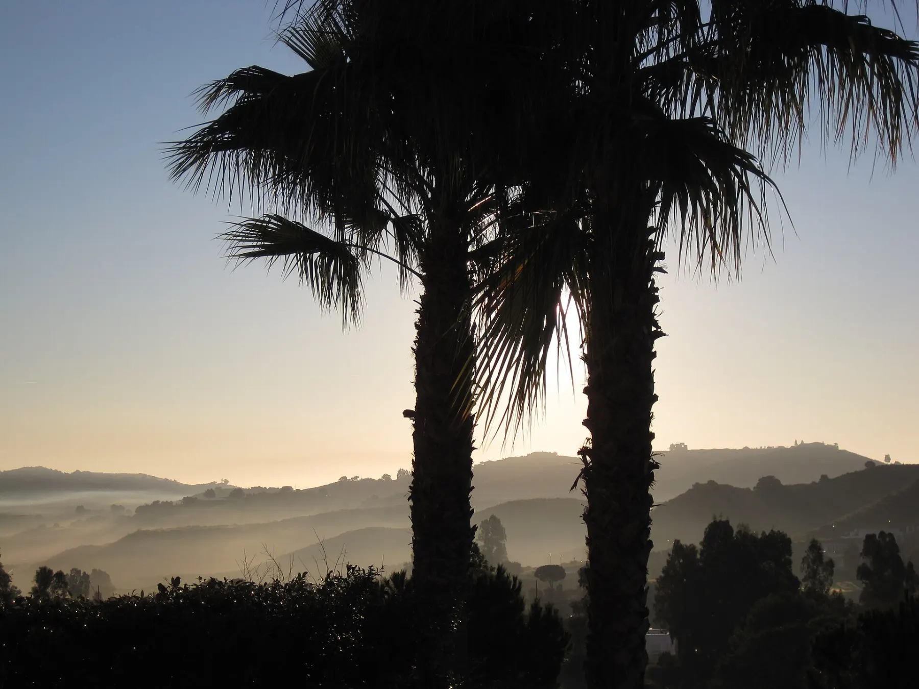 Sunrise over the misty hills inland from La Cala de Mijas